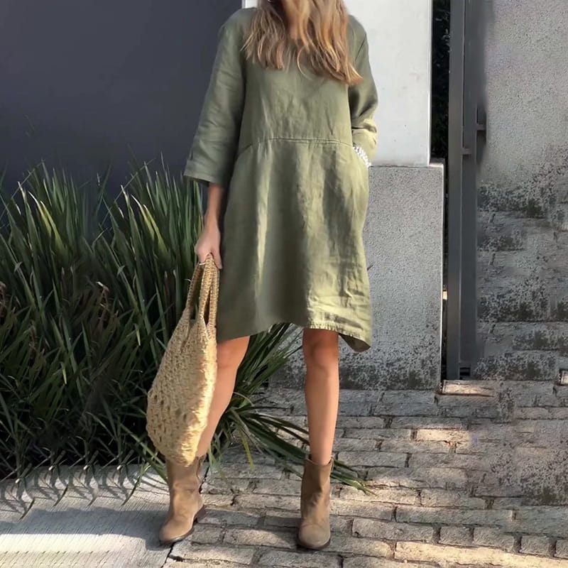 Vestido de mujer en color liso, corte holgado y con bolsillo.