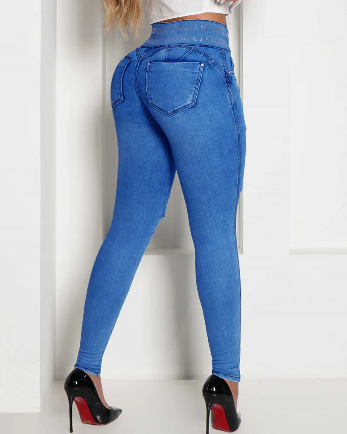 Jeans ajustados rotos de cintura alta