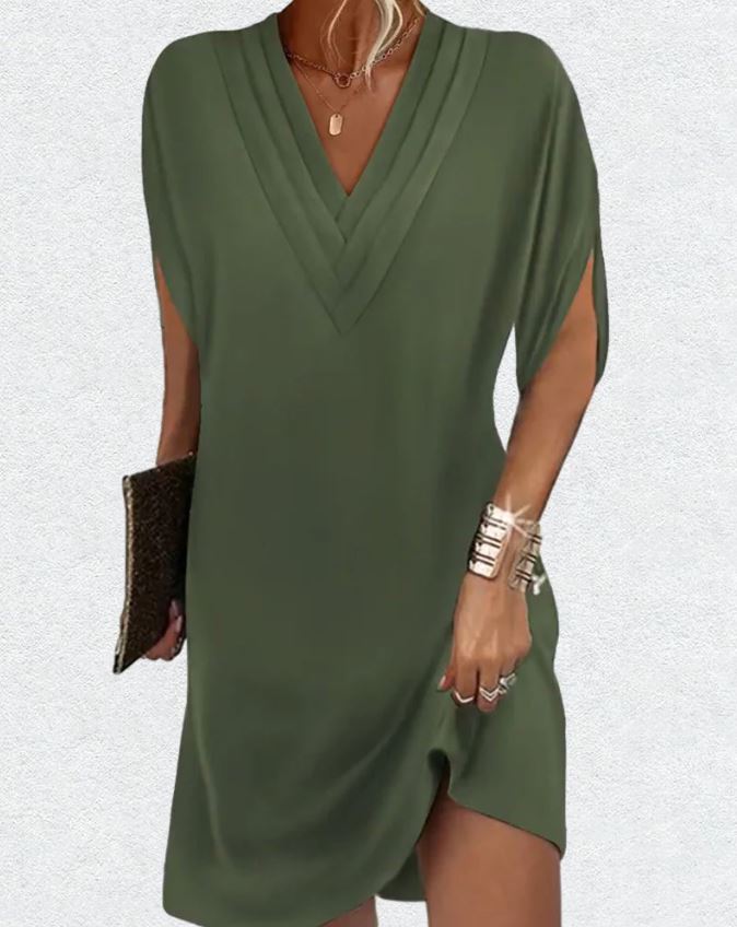 Elegante vestido liso con mangas con aberturas