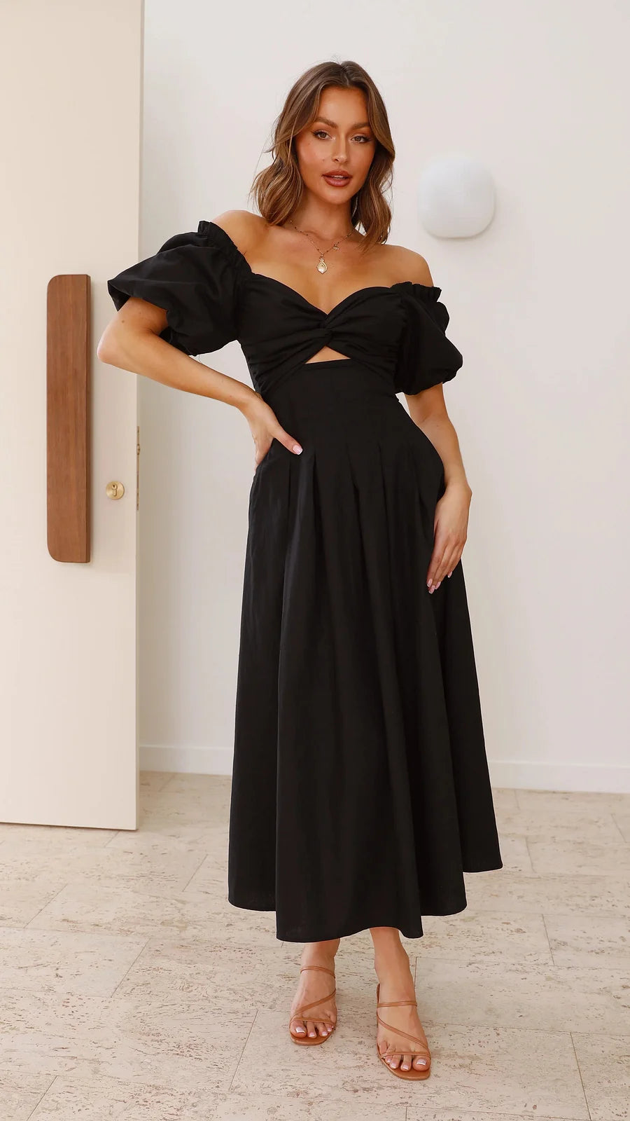Vestido con cuello en V y mangas abullonadas