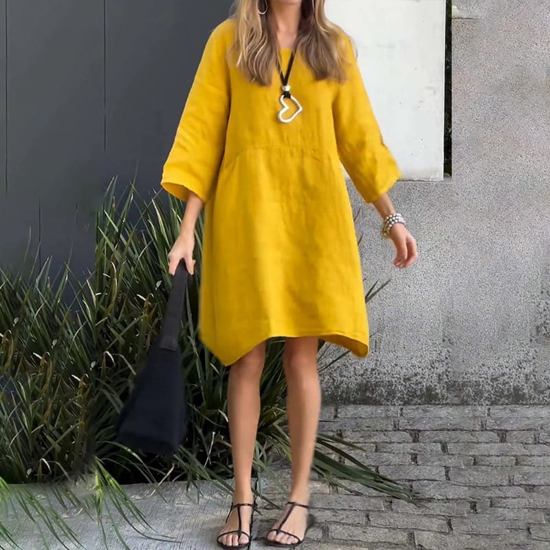 Vestido de mujer en color liso, corte holgado y con bolsillo.