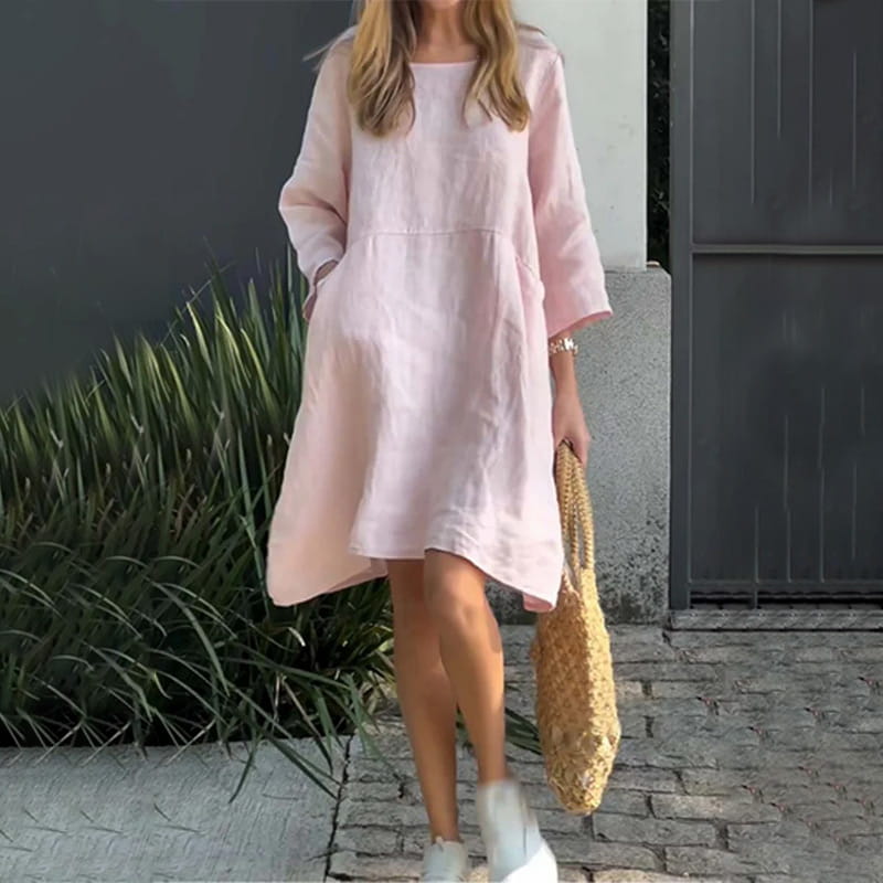 Vestido de mujer en color liso, corte holgado y con bolsillo.