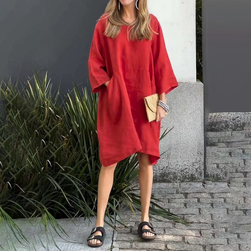 Vestido de mujer en color liso, corte holgado y con bolsillo.