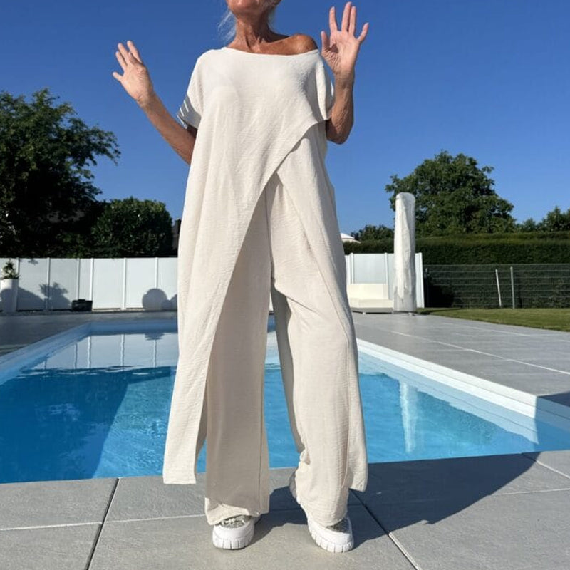Conjunto de top y pantalón con hombros descubiertos en color liso